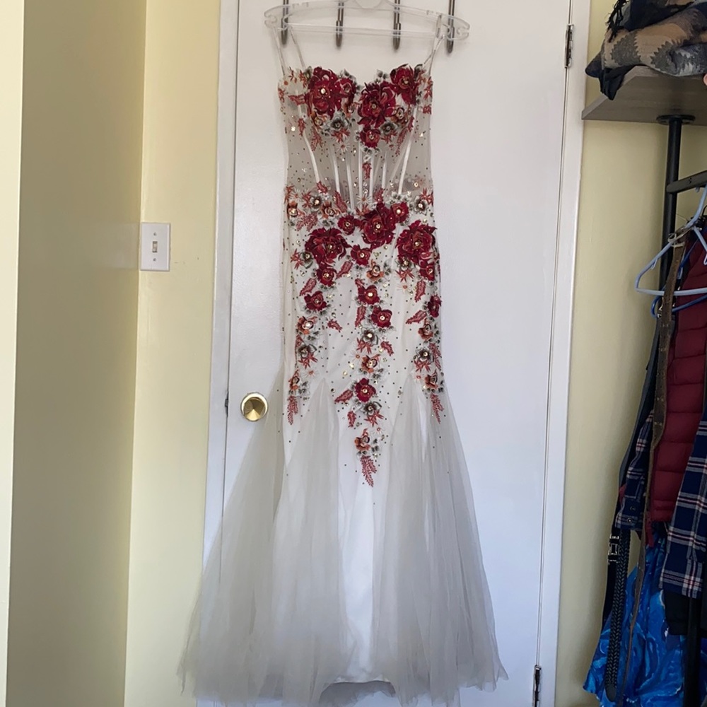 Jovani mermaid cut beaded formal gown